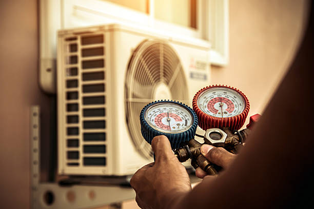 Professional Hvac technician working in University Park, TX